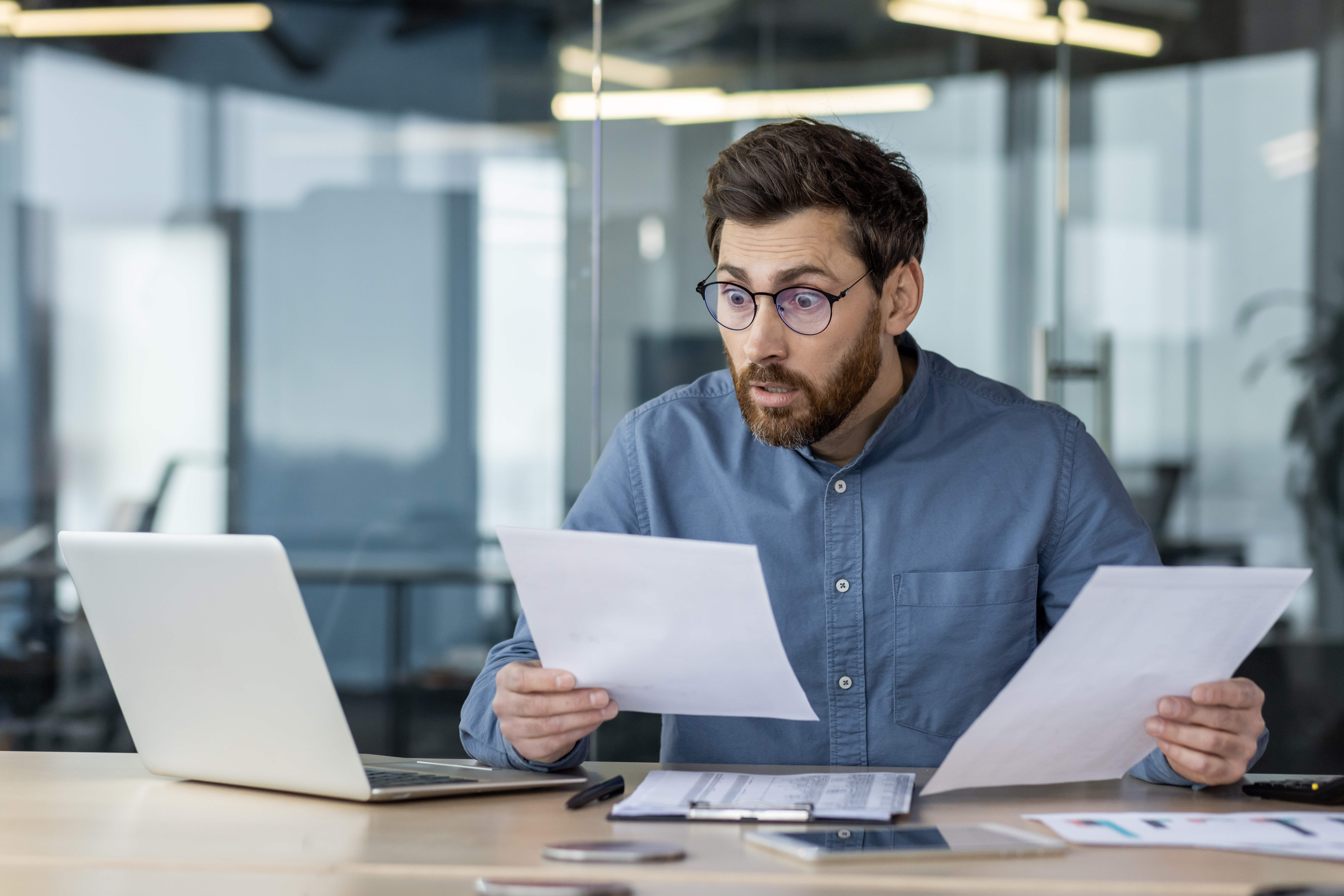 Person shocked looking at background check 