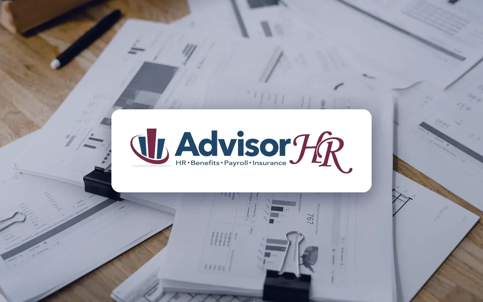 AdvisorHR logo over HR paperwork