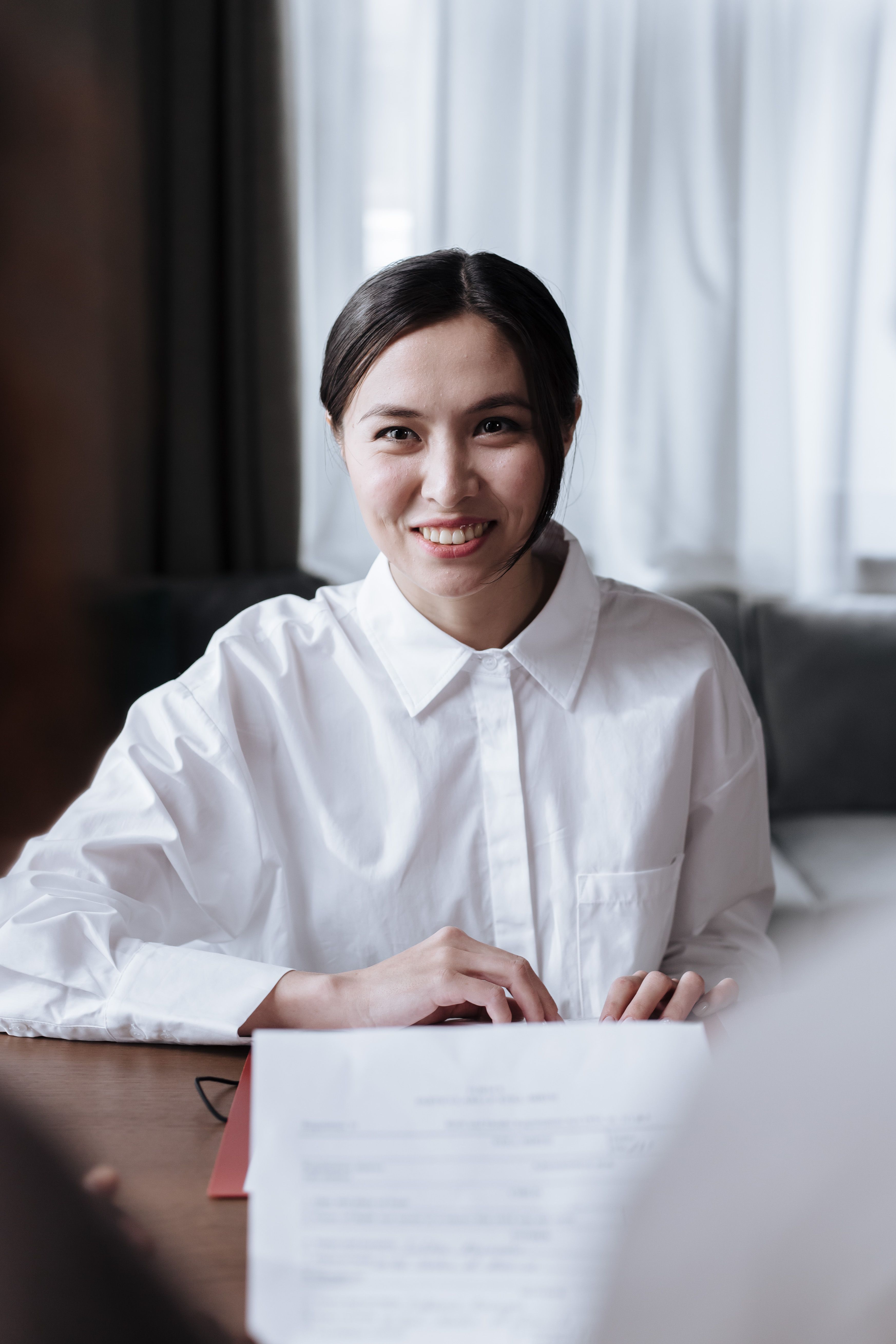 Employer reviewing candidate credentials and verification documents